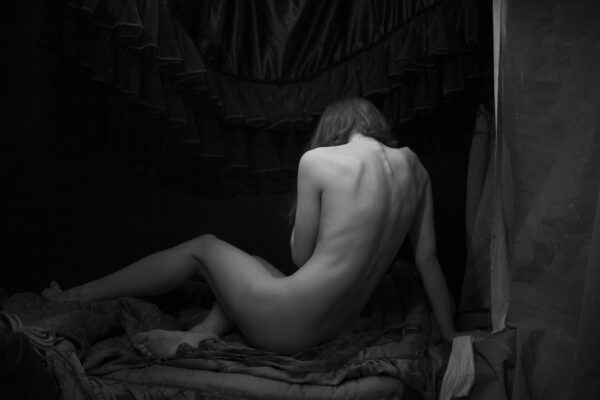 Back to Back: The Timeless Seduction of Shadow and Form